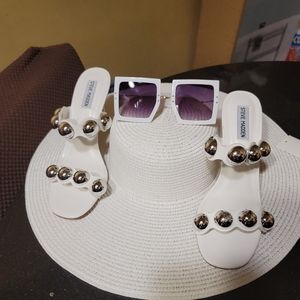 Steve Madden heels a hat and a pair of shades.